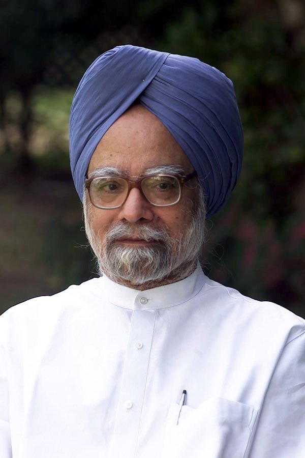 Official portrait of Dr Manmohan Singh wearing a blue turban and dark jacket